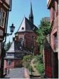 Blick von der Kugelgasse auf die kleine sp�tgotische Kugelkirche.

Marburg verdankt die Kugelkirche eine Reformationsbestrebung des ausgehenden 15. Jahrhunderts.
 