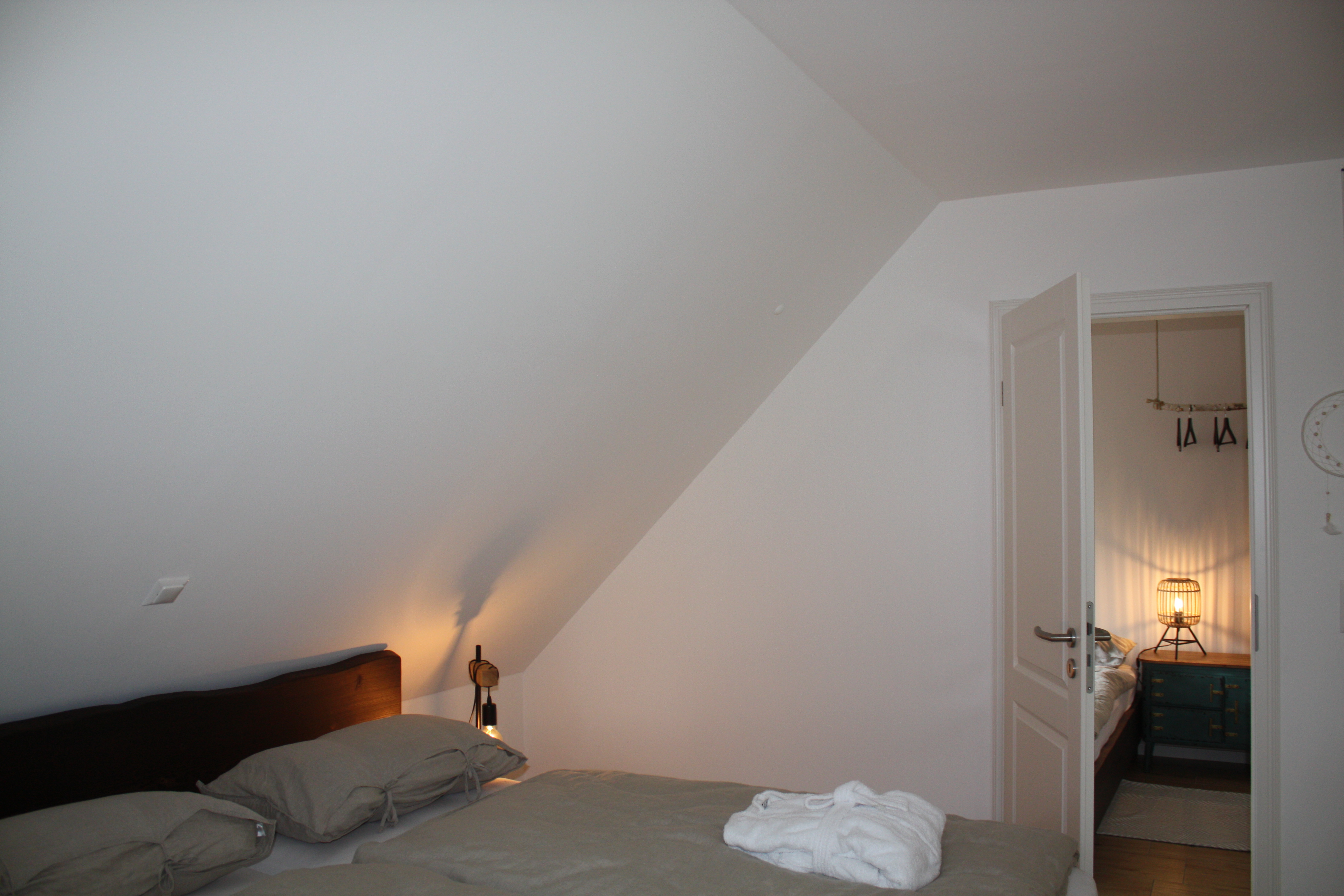 Schlafzimmer im Ferienhaus Heuliebe, Herbstein / OT Altenschlirf.
